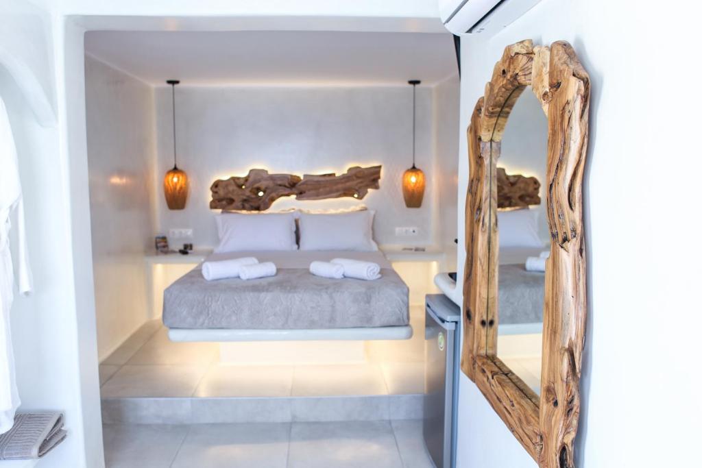 Postel nebo postele na pokoji v ubytování Villa Elina suites and more