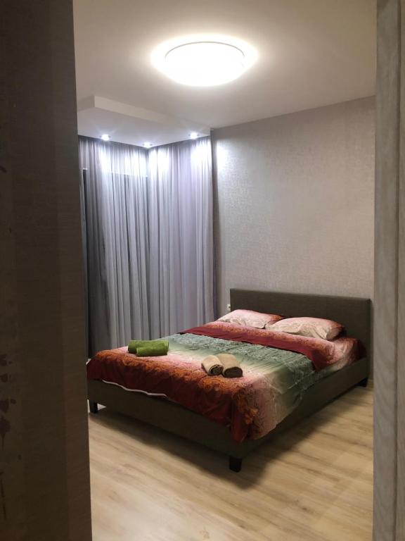 Postel nebo postele na pokoji v ubytování Tbilisi Loves You
