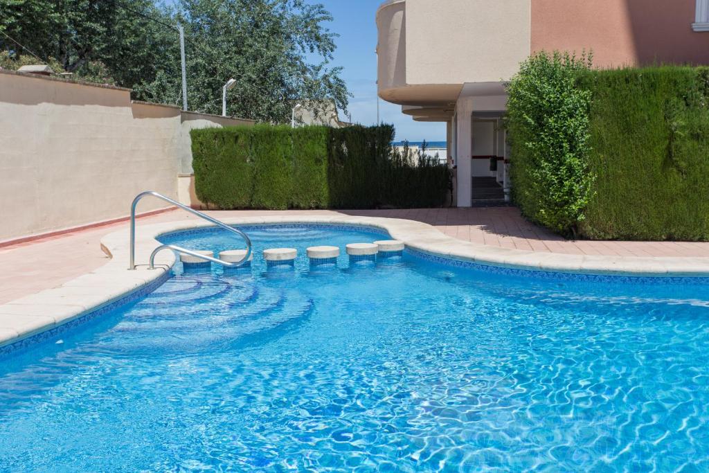 The swimming pool at or close to Dénia FRONT BEACH Apartment