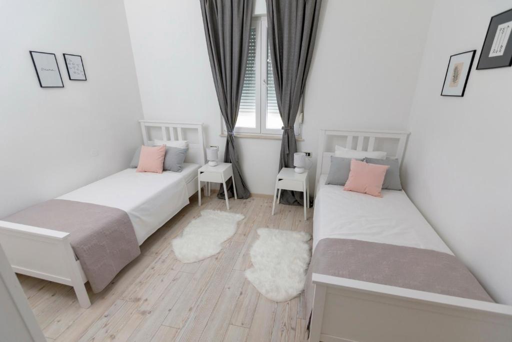Posteľ alebo postele v izbe v ubytovaní Luxury Villa Castrum