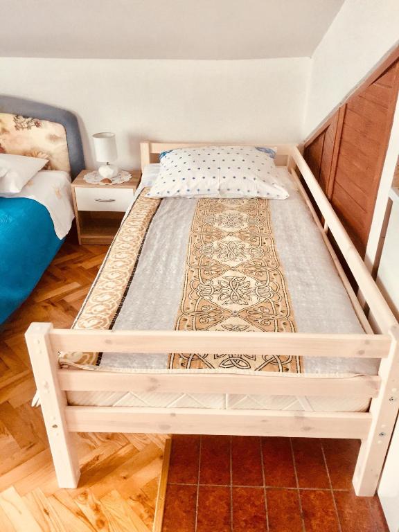 Postel nebo postele na pokoji v ubytování Apartment Martinovic