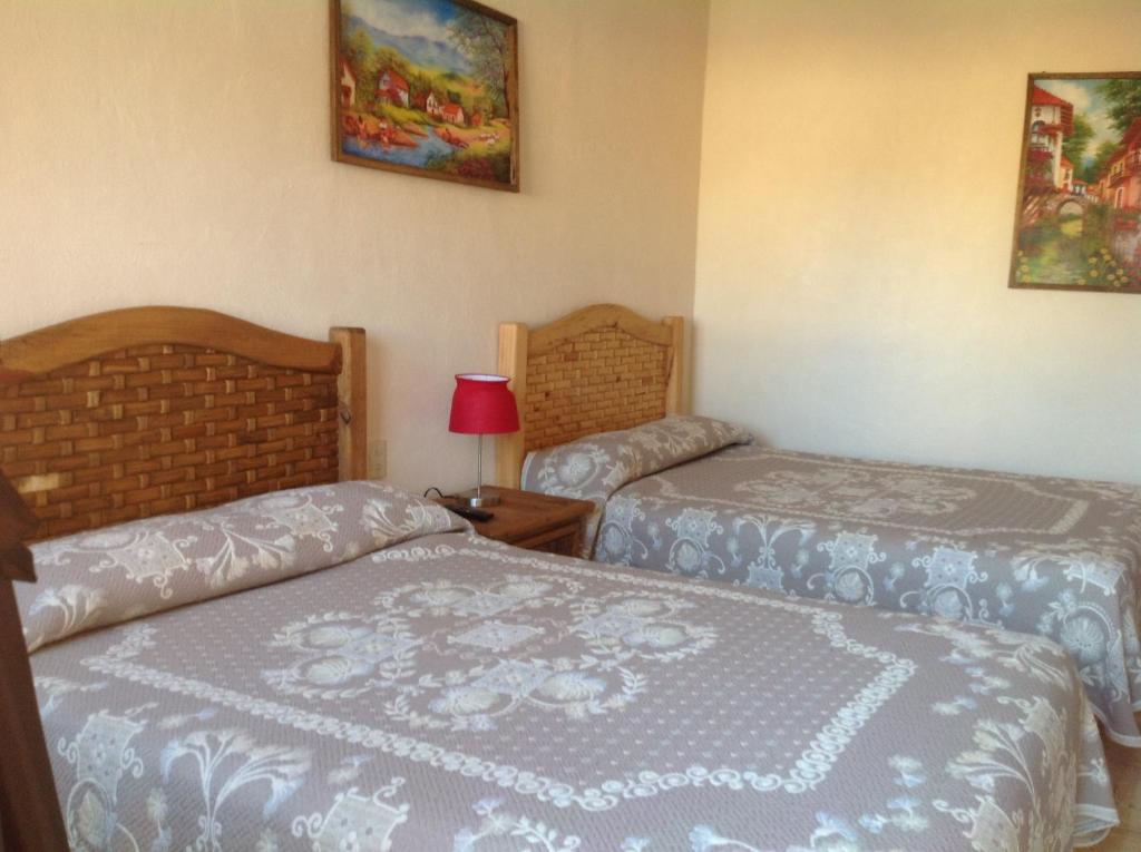 Postel nebo postele na pokoji v ubytování Casona de Cantera