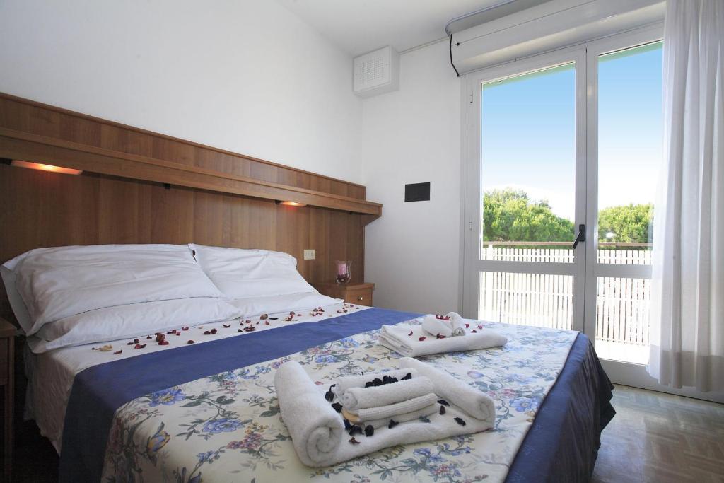 Postel nebo postele na pokoji v ubytování Hotel Aspe