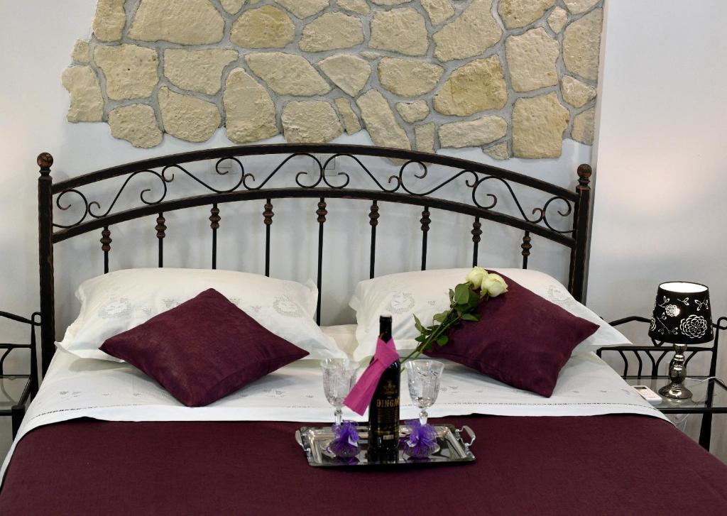Posteľ alebo postele v izbe v ubytovaní Kuzma Rooms and Apartments