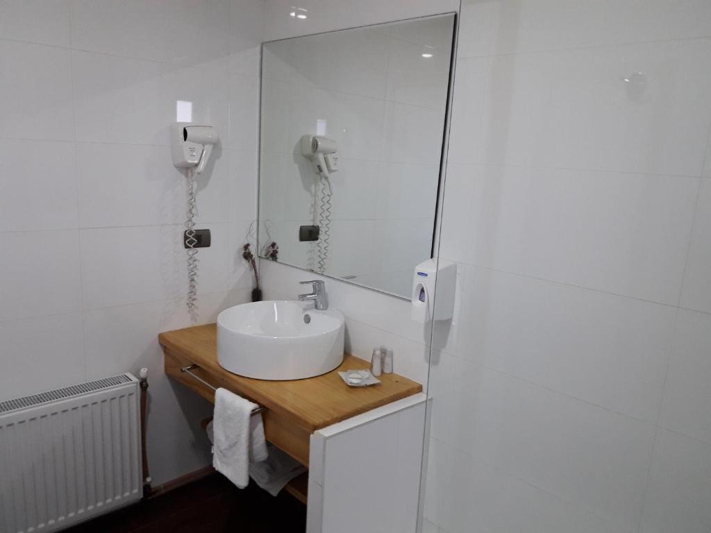 Koupelna v ubytování Dein Haus Hotel y Departamentos