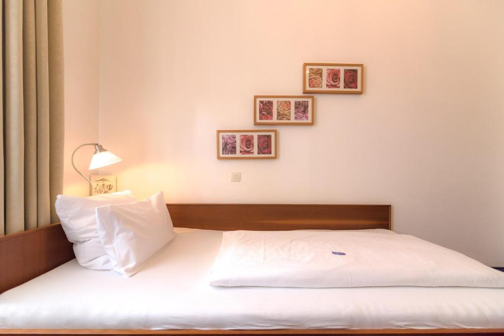 Postel nebo postele na pokoji v ubytování Hotel Etol - Superior