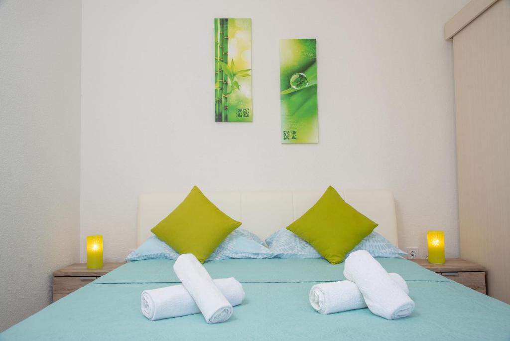 Postel nebo postele na pokoji v ubytování Apartment Ariana