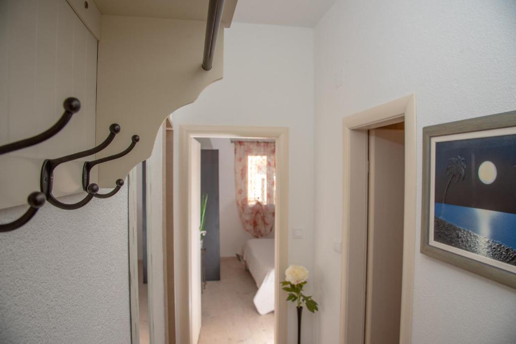 Postel nebo postele na pokoji v ubytování Apartment Ariana