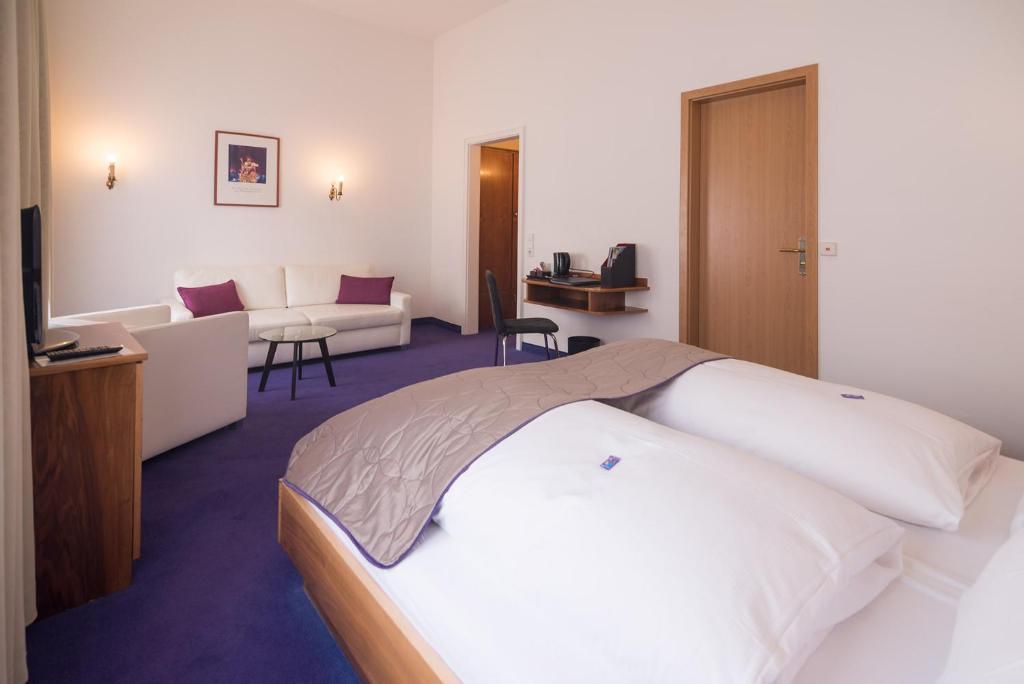 Postel nebo postele na pokoji v ubytování Hotel Etol - Superior