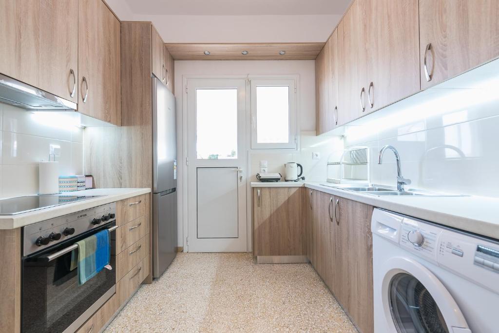 Kuchyňa alebo kuchynka v ubytovaní Stylish Athenian Flat