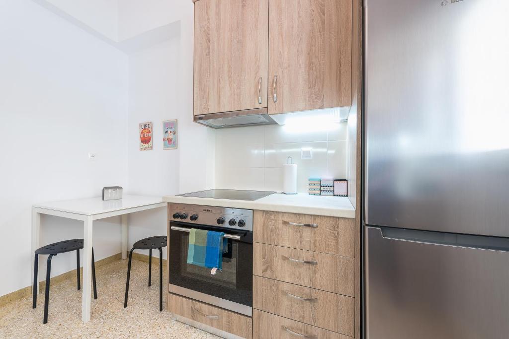 Kuchyňa alebo kuchynka v ubytovaní Stylish Athenian Flat