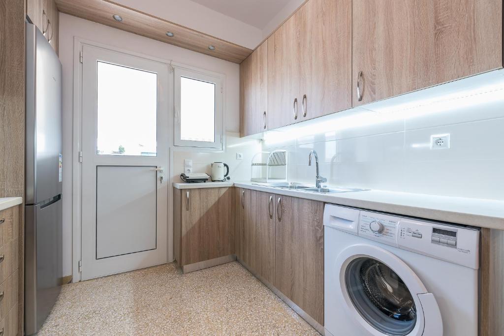 Kuchyňa alebo kuchynka v ubytovaní Stylish Athenian Flat