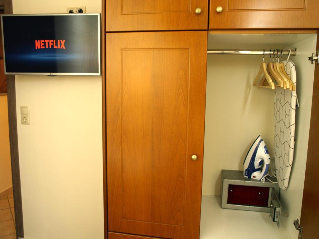 TV a/nebo společenská místnost v ubytování Urban Sea Apts