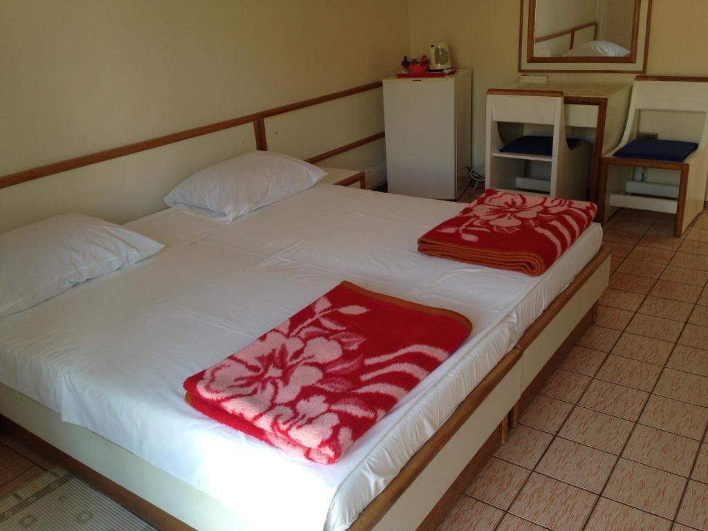 Postel nebo postele na pokoji v ubytování Villa Michel
