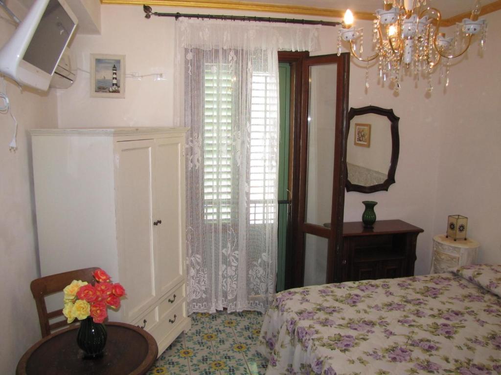 Postel nebo postele na pokoji v ubytování Guest House Al Gattopardo