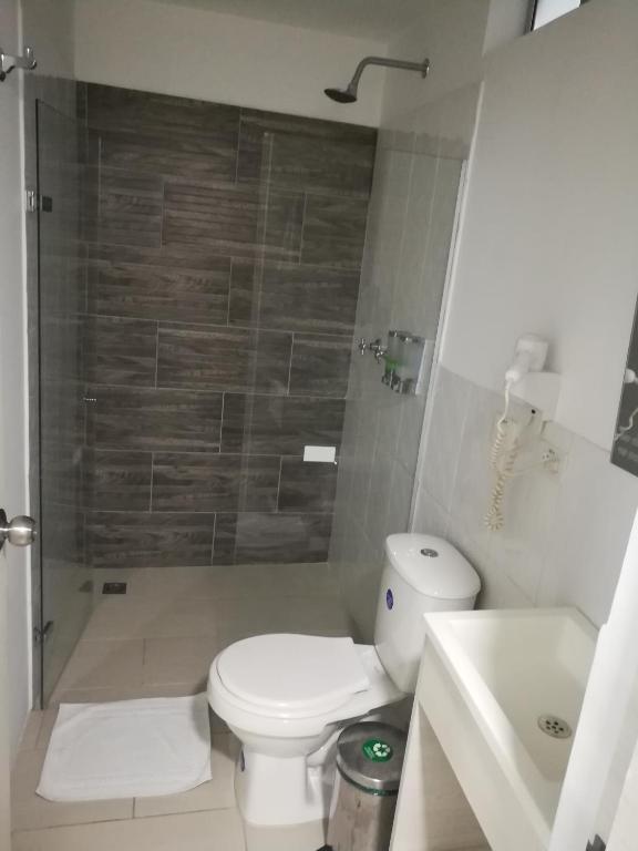 Koupelna v ubytování Almaviva Casa Hotel
