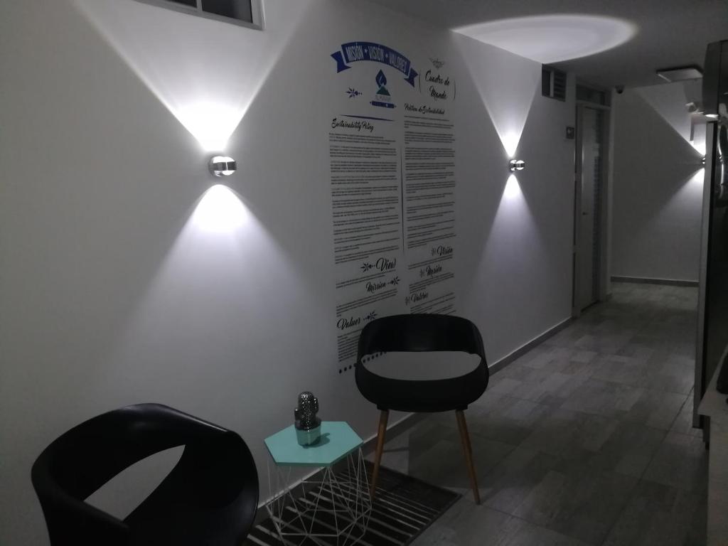 Posezení v ubytování Almaviva Casa Hotel