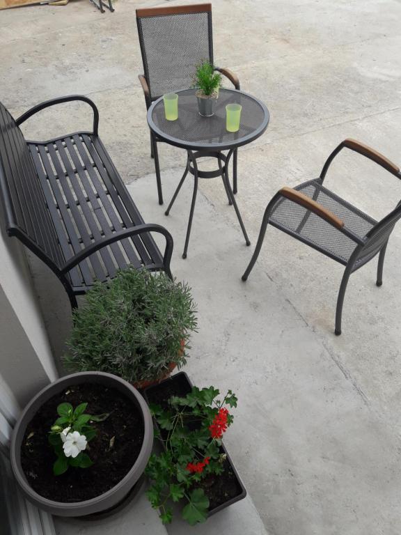 Patio alebo iná vonkajšia časť ubytovania Pauli