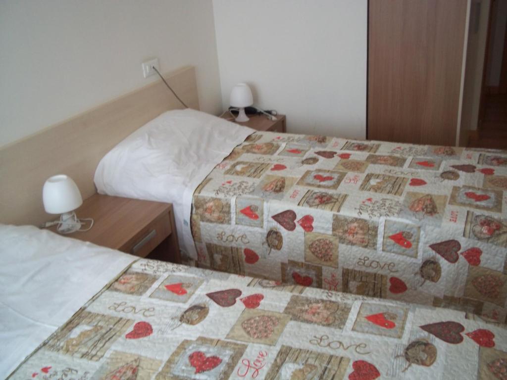 Postel nebo postele na pokoji v ubytování Hotel Gronda Lagunare