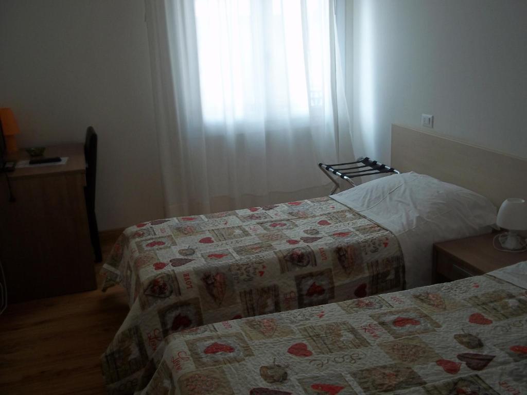 Postel nebo postele na pokoji v ubytování Hotel Gronda Lagunare