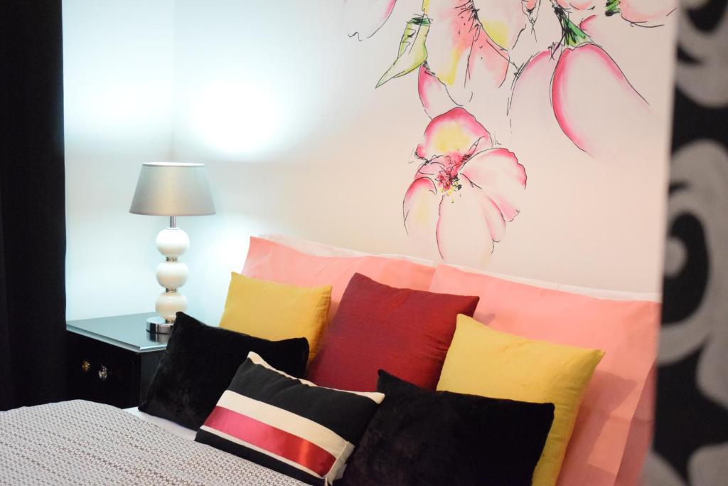 Postel nebo postele na pokoji v ubytování Glamdream Apartment