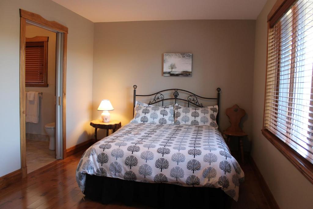 Katil atau katil-katil dalam bilik di Gîte Vita Bella B&B