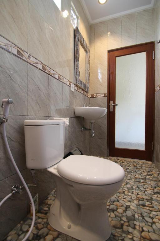 Koupelna v ubytování Jempiring Homestay