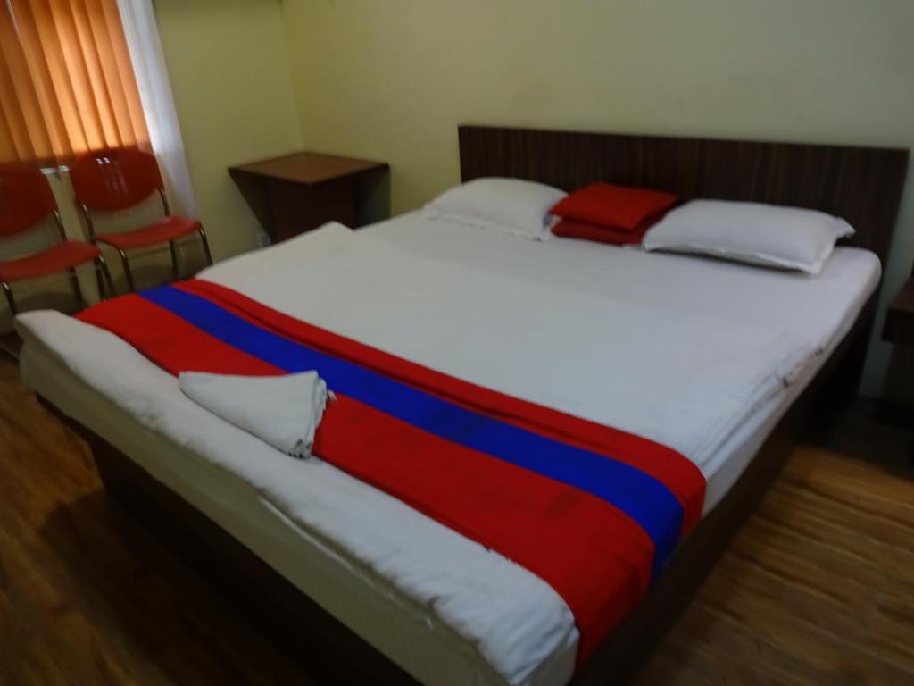 Postel nebo postele na pokoji v ubytování Monovilla Inn