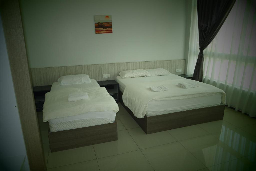 Postel nebo postele na pokoji v ubytování Lim Mini Hotel