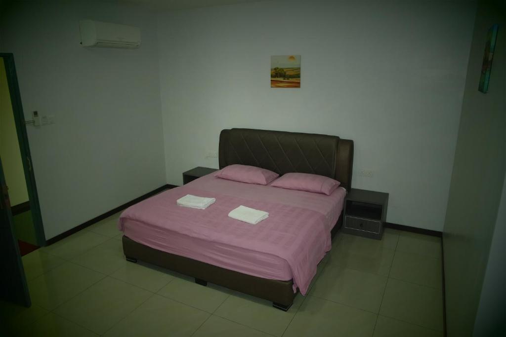Postel nebo postele na pokoji v ubytování Lim Mini Hotel