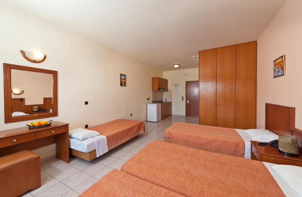 Postel nebo postele na pokoji v ubytování Alea Hotel Apartments