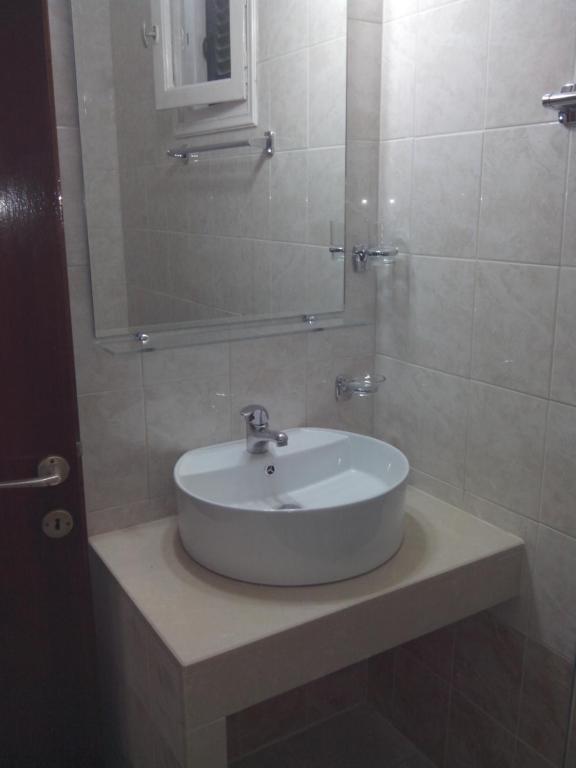 A bathroom at Alex Apartments