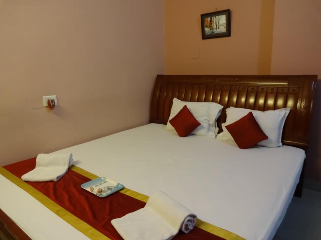 Postel nebo postele na pokoji v ubytování Hotel Avisha