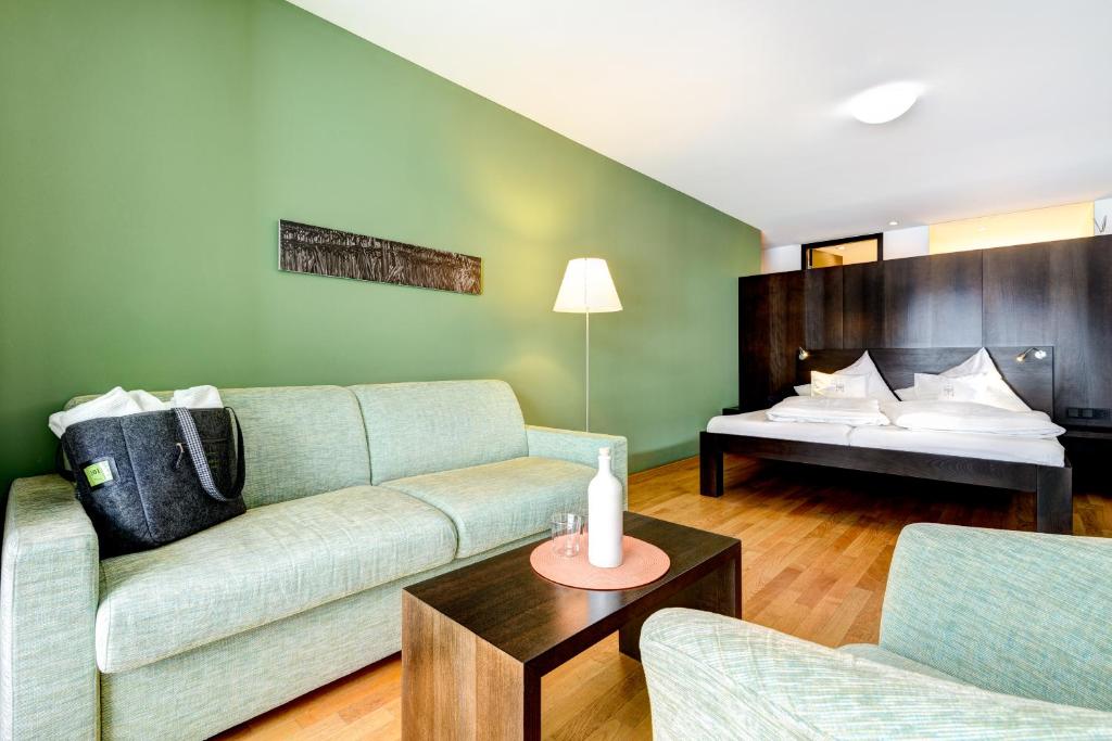 Postel nebo postele na pokoji v ubytování Aktiv-Hotel Sarotla