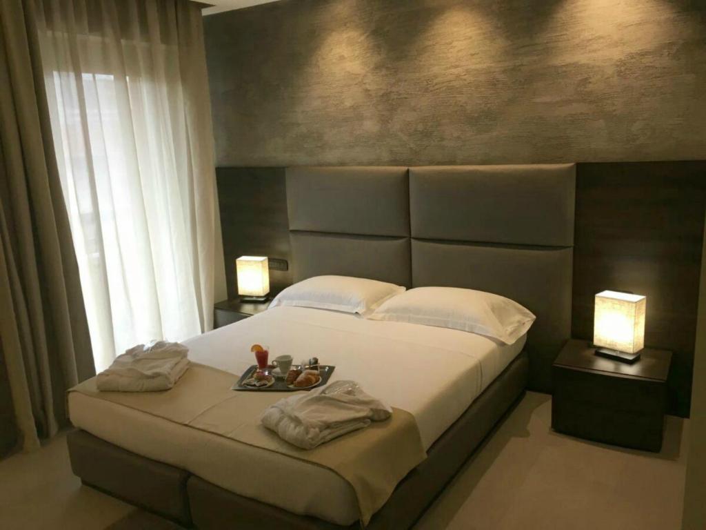 Letto o letti in una camera di Plus Welcome Milano