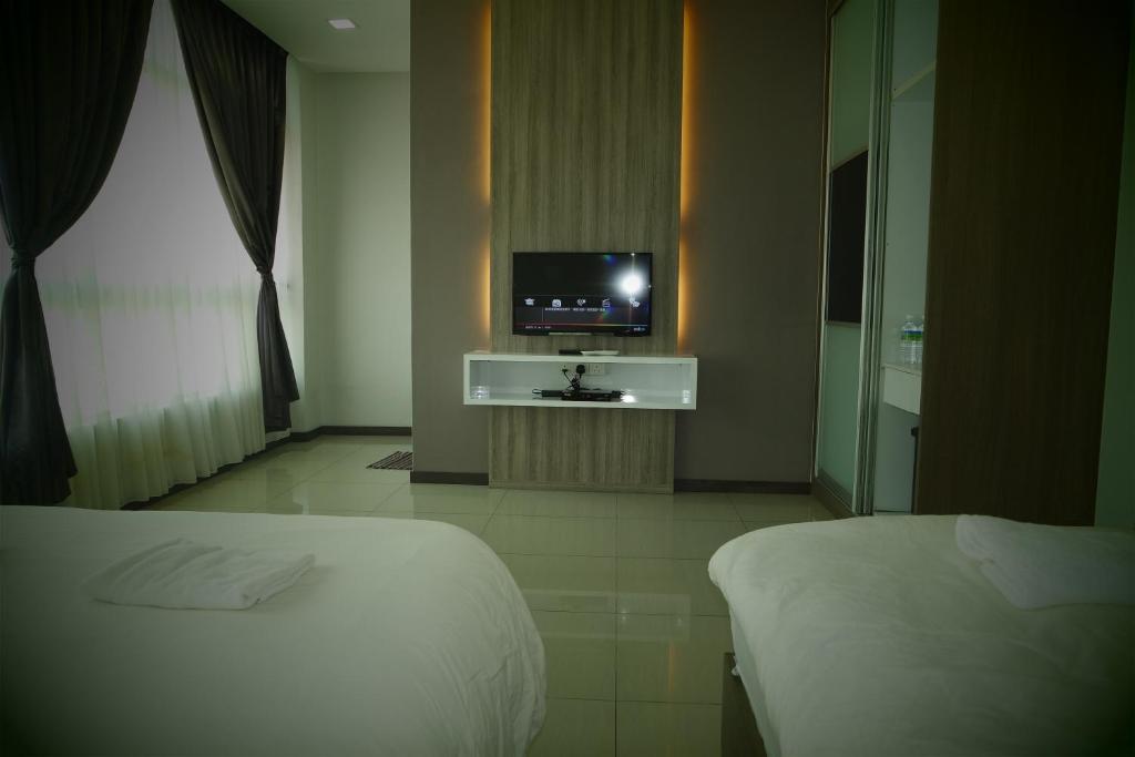 Postel nebo postele na pokoji v ubytování Lim Mini Hotel