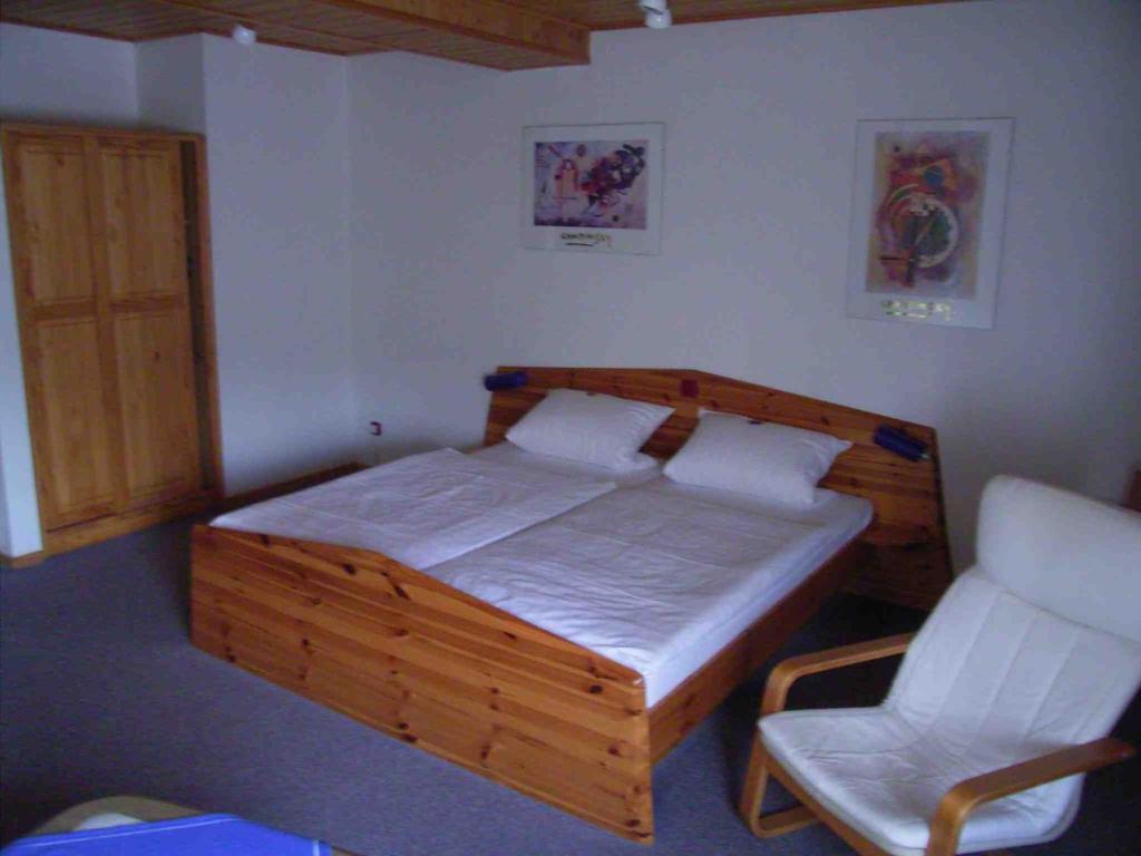 Postel nebo postele na pokoji v ubytování Smile Hotel