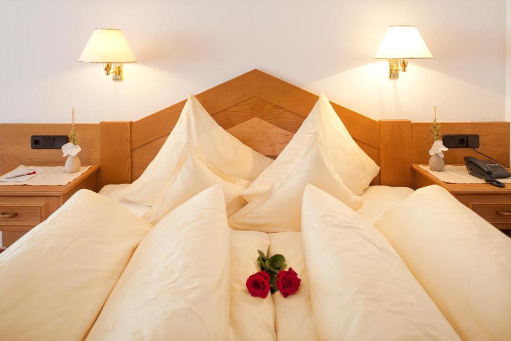 Postel nebo postele na pokoji v ubytování Hotel Jagdhof Bed & Breakfast