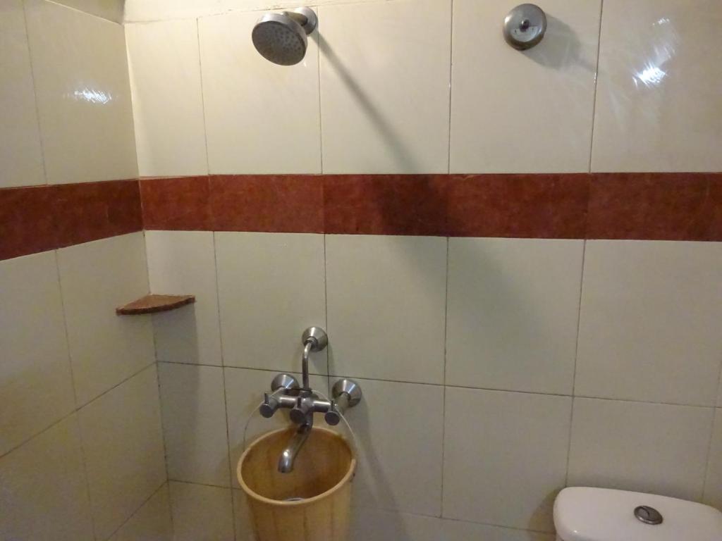 Koupelna v ubytování The Kei Suites