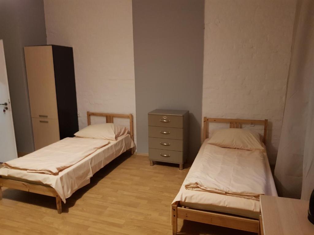 Postel nebo postele na pokoji v ubytování Kaktus Guest House