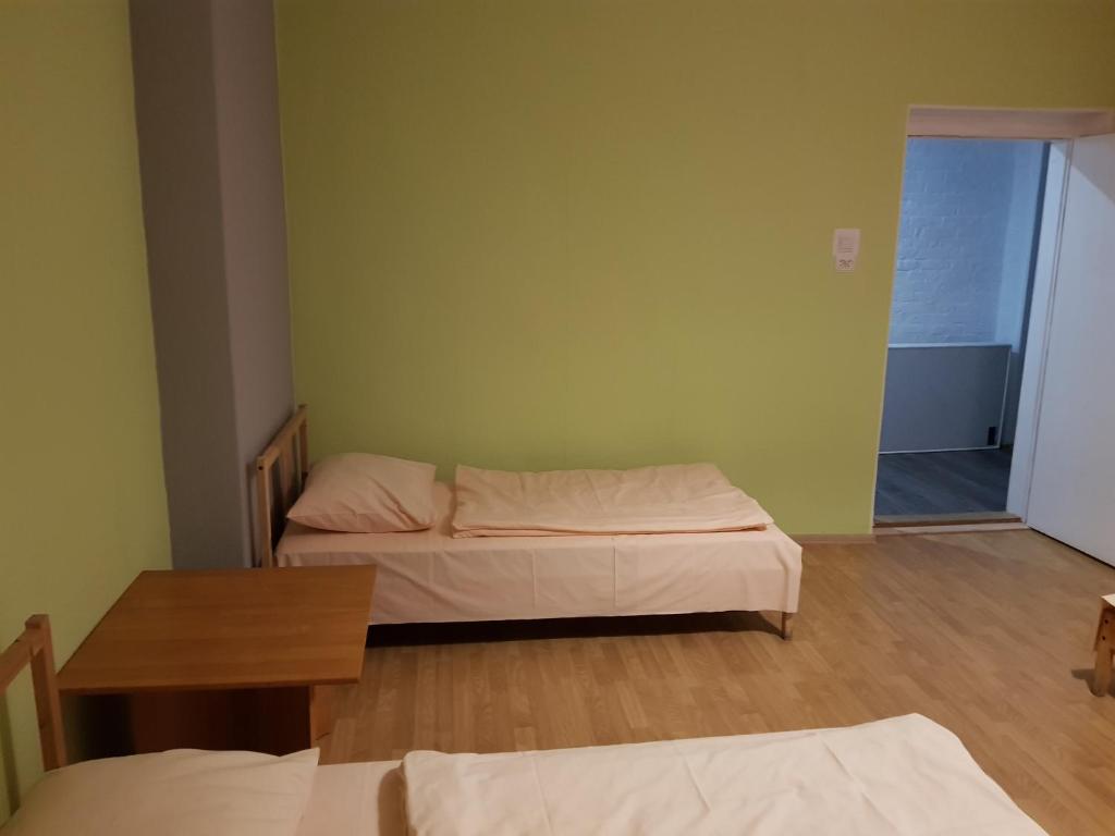 Postel nebo postele na pokoji v ubytování Kaktus Guest House