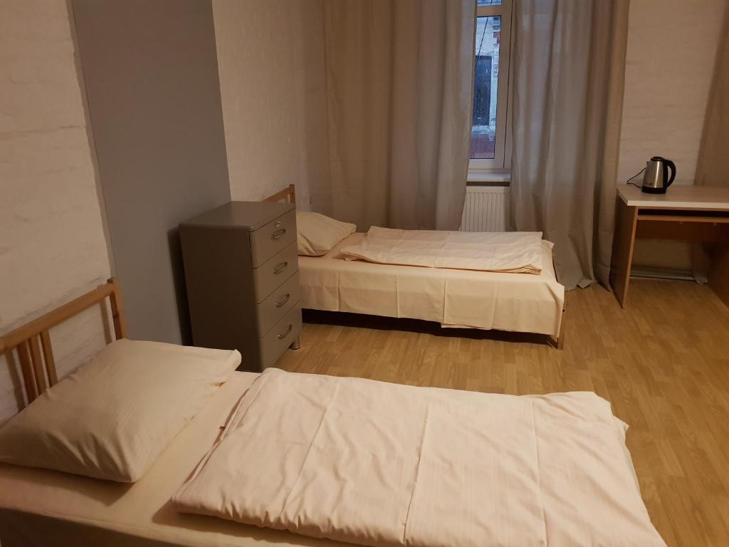 Postel nebo postele na pokoji v ubytování Kaktus Guest House