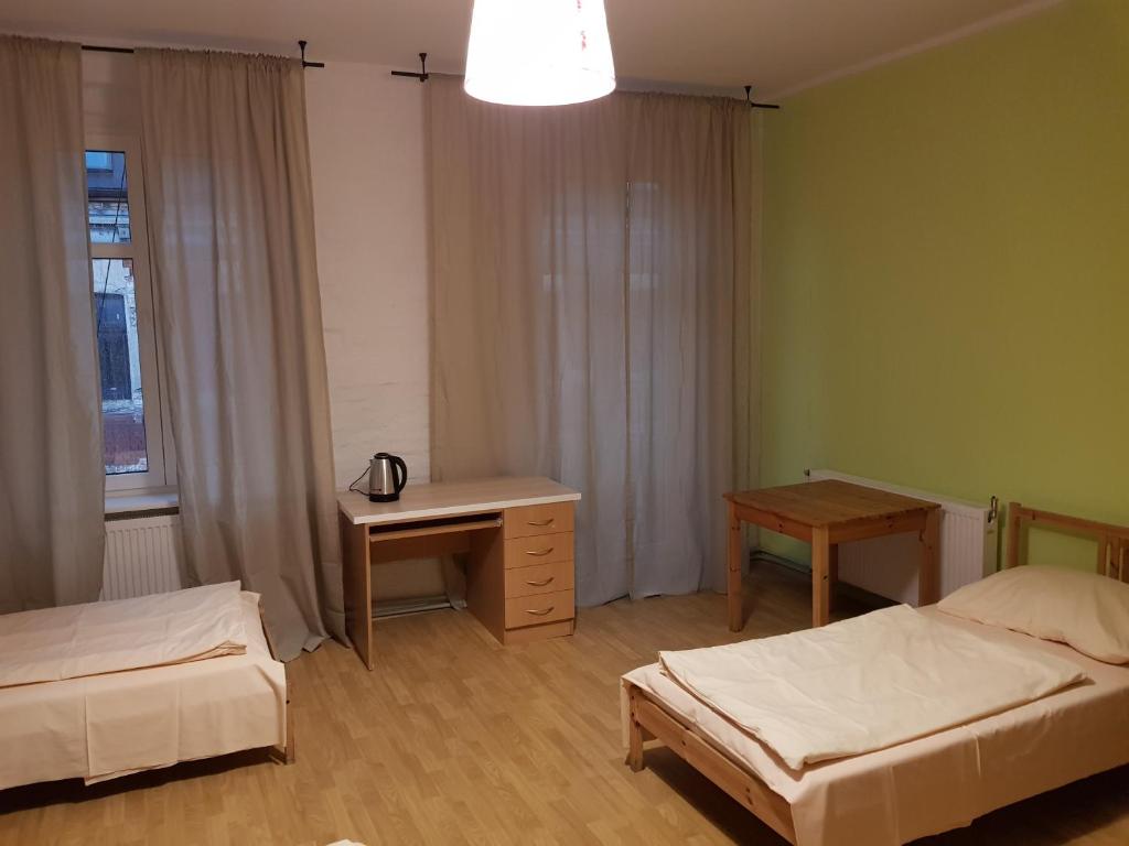 Postel nebo postele na pokoji v ubytování Kaktus Guest House