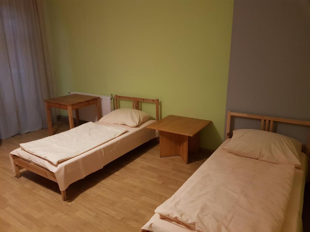 Postel nebo postele na pokoji v ubytování Kaktus Guest House