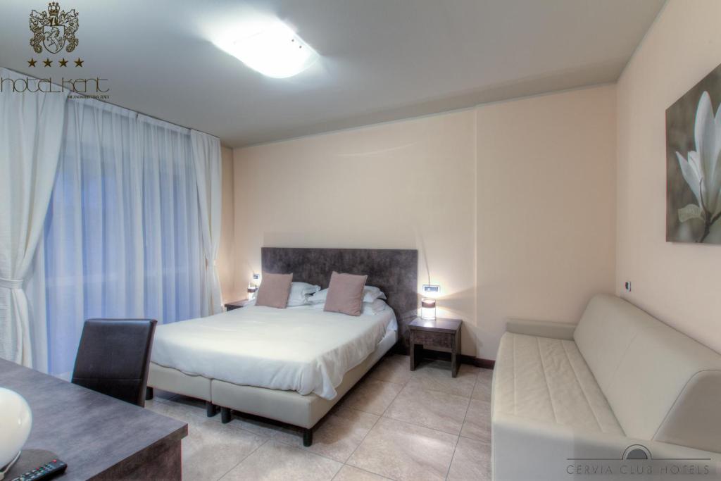 Postel nebo postele na pokoji v ubytování Hotel Kent
