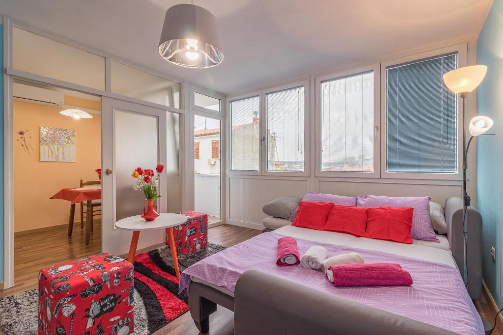 Posteľ alebo postele v izbe v ubytovaní Cosy apartment Zupanic