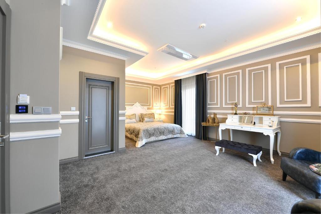 Postel nebo postele na pokoji v ubytování D'LUX BOUTİQUE HOTEL