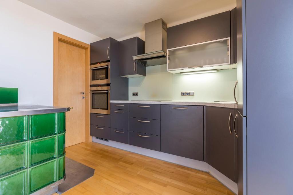 Kuchyň nebo kuchyňský kout v ubytování Stadlhof