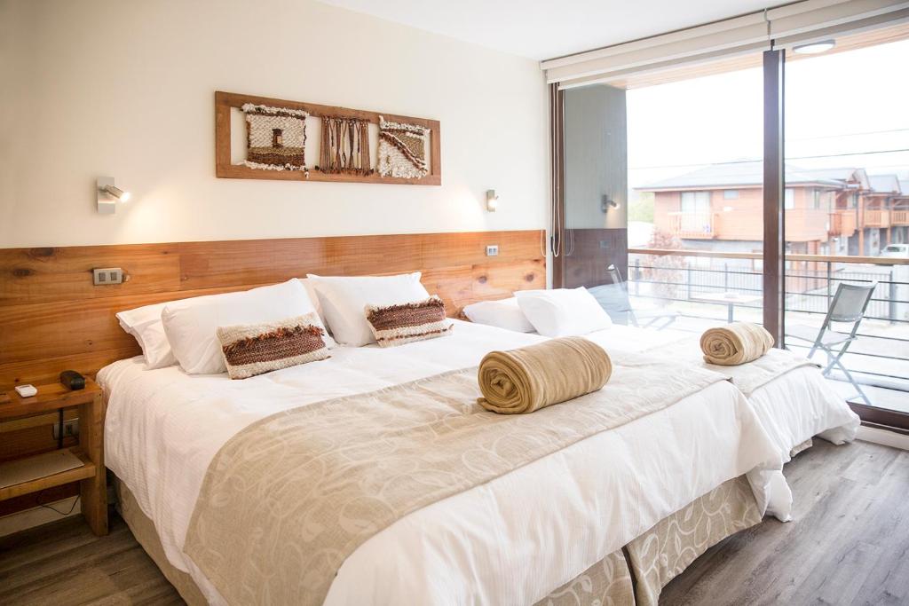 Cama o camas de una habitación en Maki Hotel