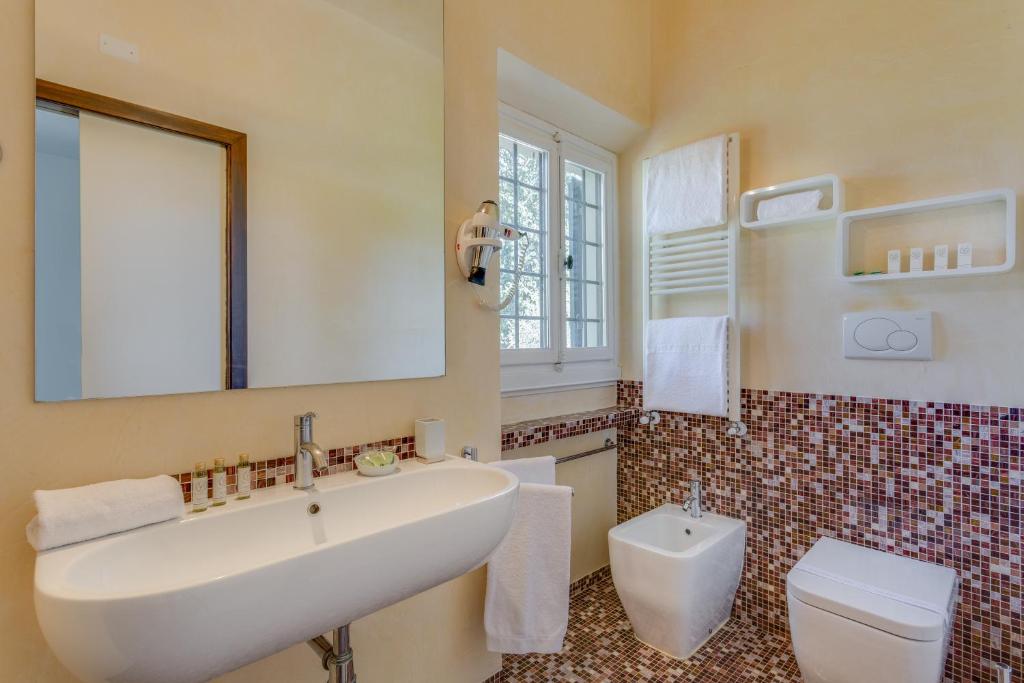 Kúpeľňa v ubytovaní Villa I Barronci Resort & Spa